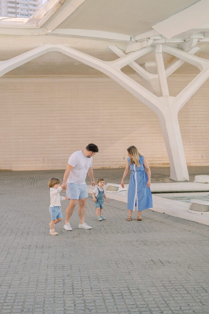 Family exploring the City of Arts and Sciences during a morning photoshoot in Valencia
